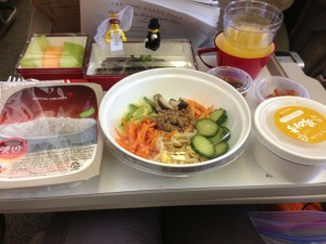 Yum! Bibimbop with cod soup and melon. Airline delicious.