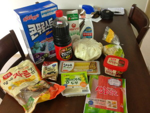 I like the Korean frosted flakes and the huge-o soy sauce. Also rice noodles, mini seaweed wraps, bamboo(?), tofu, fake crab, chili paste, cabbage, multi-purpose cleaner, and milk. Ready for the week.