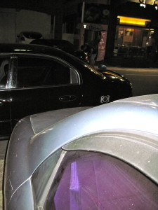 Our car, with another car very tightly parked behind it.