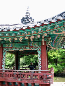 Patrick in the pagoda-like structure in the traditional Korean garden. Beautiful painting!