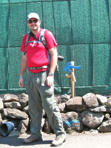 Olle trails are very well signed, but in lots of different ways. Every few dozen meters and at any intersection you'll see paint, or ribbons, or wooden signs in blue and orange, to help point you in the right direction. Here's Patrick with one version...