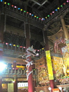 The interior was open to all three stories, all decorated and beautiful. The dragon carvings wrapped up each support pole.