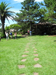 Walking on the lovely manicured lawn into the resort. What? This is a hiking trail?