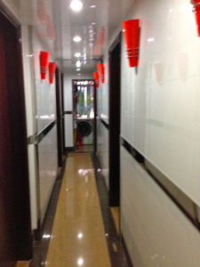 The hallway of our hostel, after we enter the secure area. So skinny!