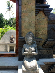 A hindu guardian outside and inside the gate.