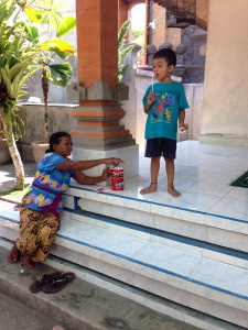 Our walk-buddy brought cookies for Yandira's family. Before we left we watch grandma and son enjoy some chocolate.