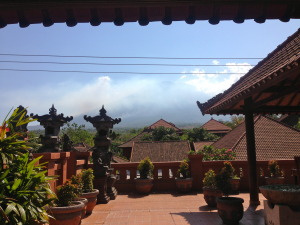 The lovely volcano view from our restaurant balcony. There was a forest fire making lots of smoke.